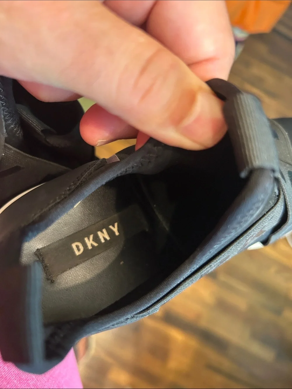 DKNY Black Slip-On Logo-Trim Women’s Sneakers with White Sole